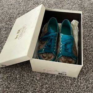 Tear and brown coach shoes